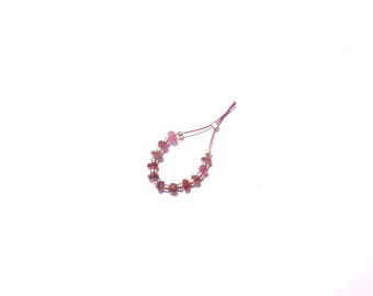 Pink tourmaline: 11 MICRO faceted rondelles irregular 3/3.5 mm diameter x 1.5/2 mm band