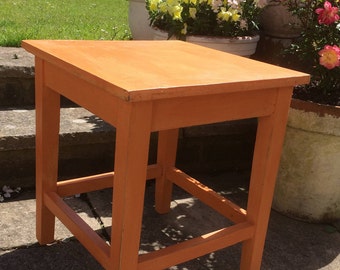 Orange painted side table