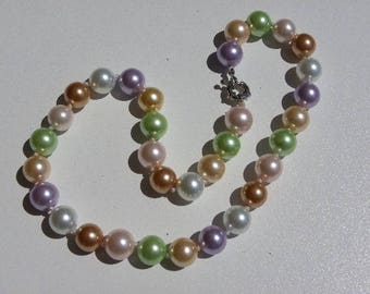Necklace pearls of coquillage12 mm with beautiful colors