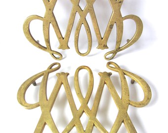 Pair of Brass Cypher Trivets