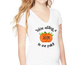 We're adding a pumpkin to out patch Fall/Halloween maternity shirt/ pregnancy announcement