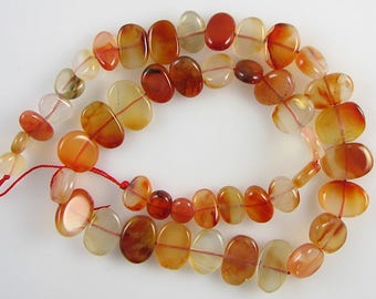 8-14mm natural carnelian flat oval beads 16" strand 10376