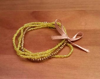 Bracelet Bohemian faceted bow with mustard yellow and Golden beads: silence is golden