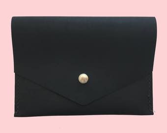 Black leather clutch with snap button