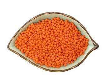 100 orange glass Czech seed beads