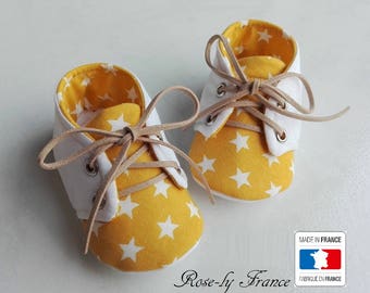 White Star (baby shoes) and yellow baby booties