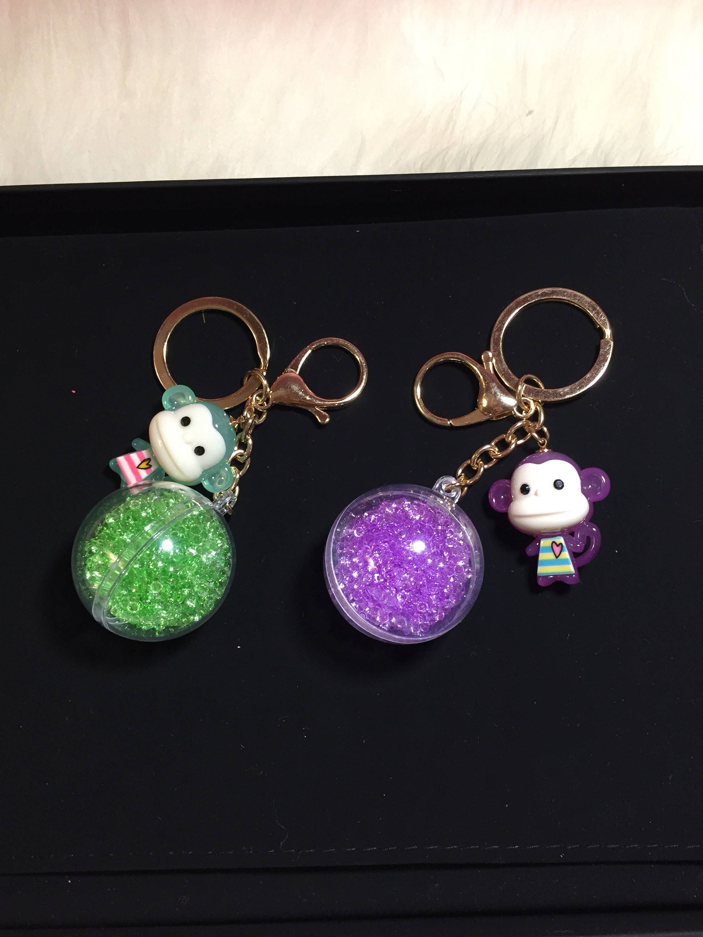bag brand with monkey keychain