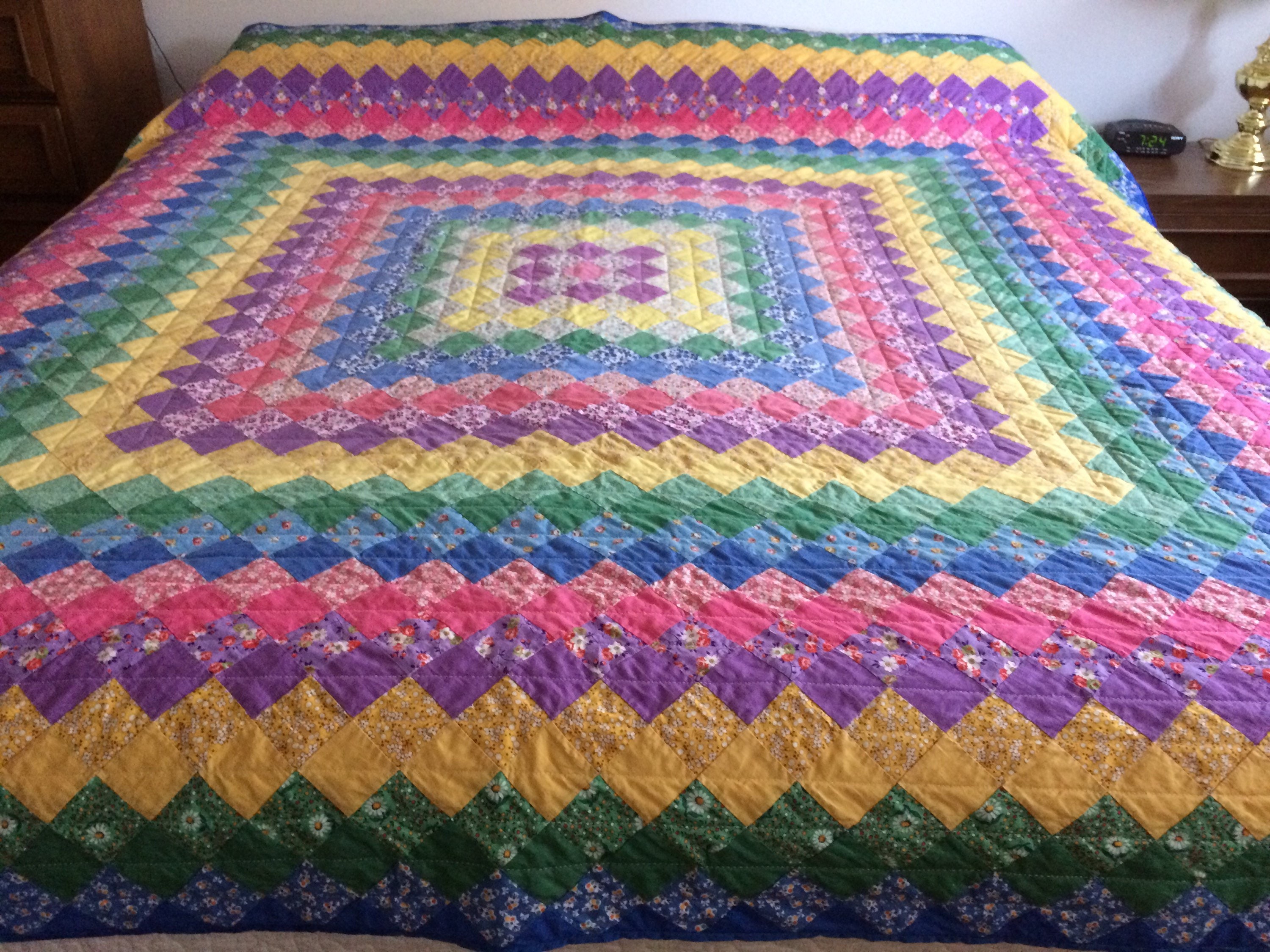 Vintage hand quilted king size Trip Around The World quilt