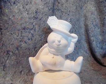 Ceramic Bisque Ready to Paint Snowman Sitting in the Snow