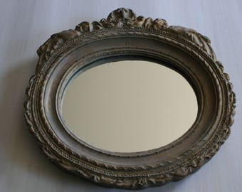 Oval Mirror Adorned with Cherubs / Cherub Wall Mirror
