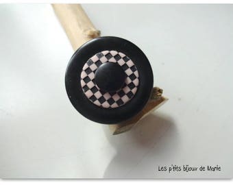Black button and pink and black damie ring