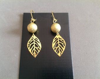 Pair of Golden dangle earrings