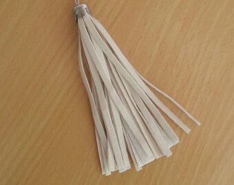 Off white suede tassel