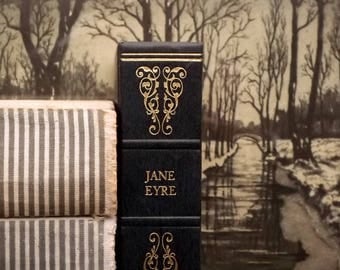 Jane Eyre book by Charlotte Bronte bound in dark blue faux leather