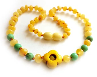 NEW Unique Baby Teething Baltic Amber Necklace with Flower Pendant