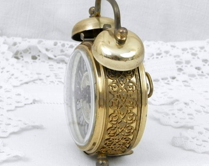 Small Working Vintage West German 1960s Metal Mechanical Wind Up Alarm Clock with Roman Numerals and Filigree Decoration, Mid Century Small Working Vintage West German 1960s Metal Mechanical Wind Up Alarm Clock with Roman Numerals and Filigree Decoration, Mid Century