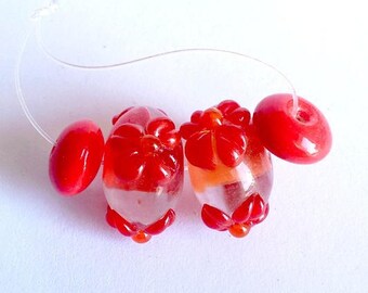 Set of 4 Lampwork Glass Beads 18 and 10mm, transparent and orange