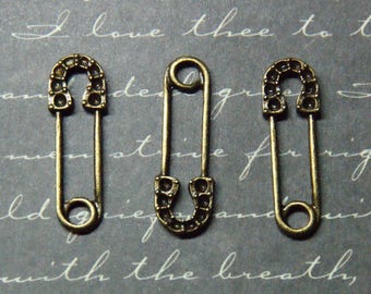 3 charms 8x23mm bronze metal safety pin