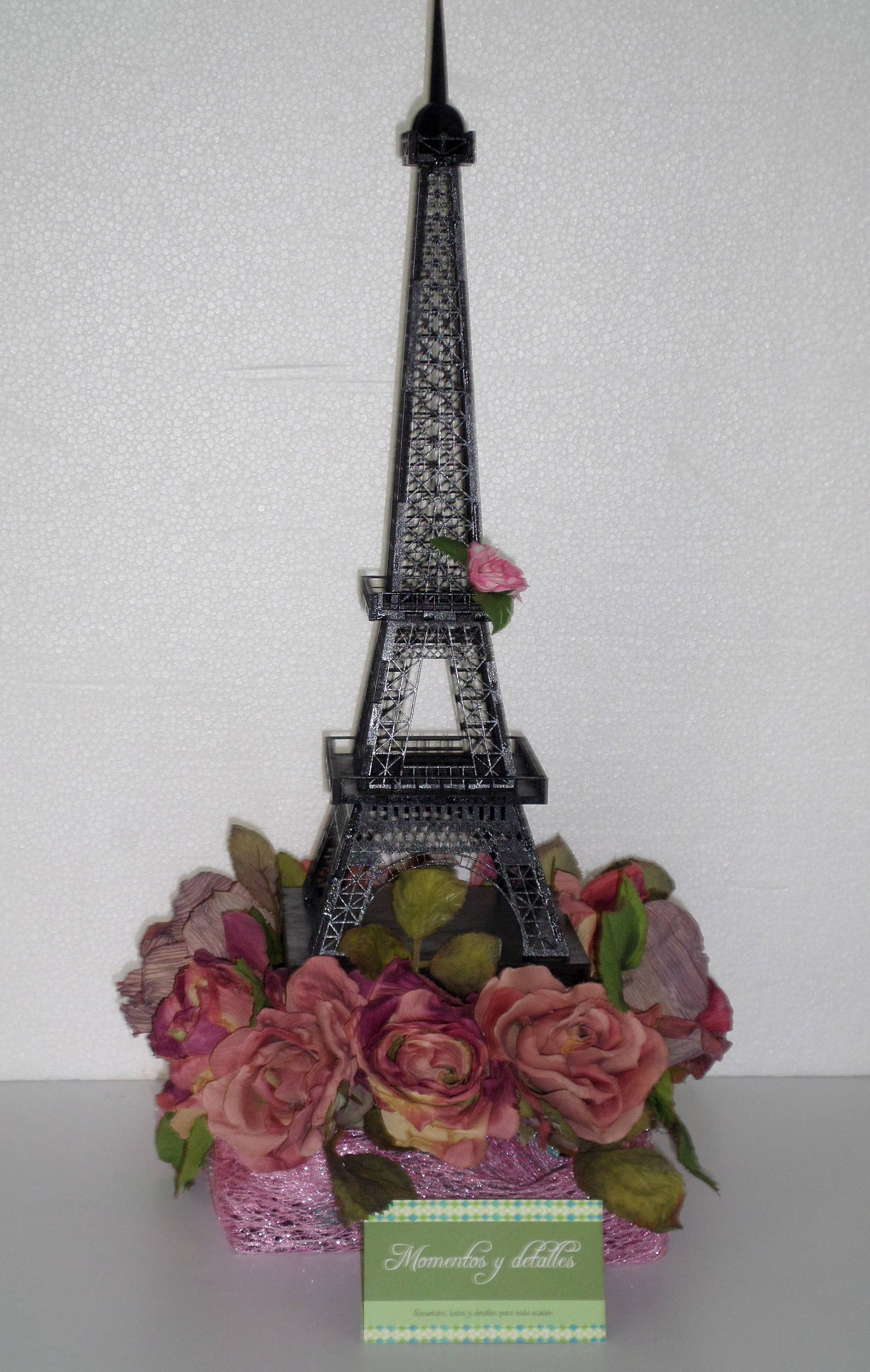 Eiffel Tower centerpiece with flowers quinceanera