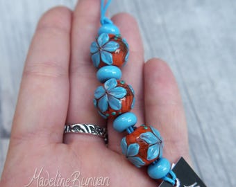 Orange and Turquoise bright flower rounds Lampwork bead set (3 plus 4 spacers) SRA