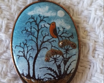 Winter bird locket