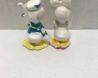 donald and daisy duck figurines