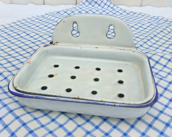 Vintage French enamelware soap dish. White enamel with blue trim.
