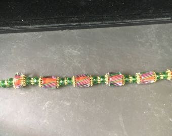Beaded green and gold bracelet