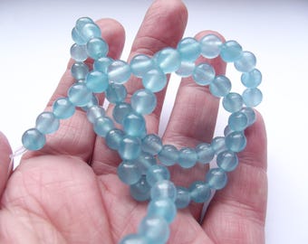 62 round beads 5-6 mm REIA 431 aqua quartz smooth