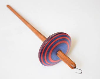 Top whorl drop spindle crafted from Spectraply and canarywood 1.7oz