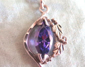 Sterling Silver and Black Hills Gold Pendant with Purple Stone