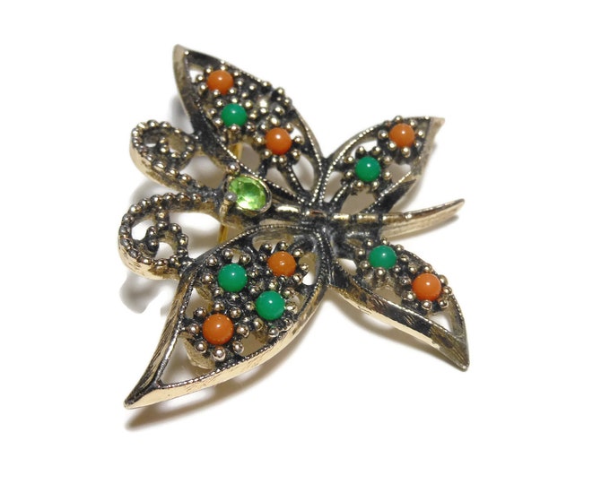 Sarah Coventry butterfly brooch, open work pin, rhinestone head, glass cabochon beads wing, gold tone, green orange, 'Wings of Fashion' 1974