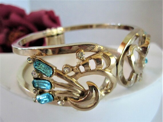 Aqua Rhinestone Bracelet - Blue Hinged Bangle - Signed Pat Pend. Gold Tone
