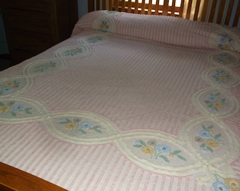 Vintage Chenille Bedspread, full or queen size, pink with floral design in blue and yellow.
