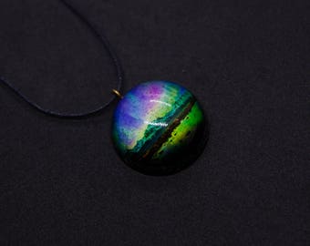 Amulet in resin and aurora borealis crystals