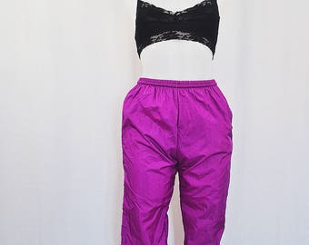 purple windbreaker pants