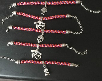 Cord bracelets with novelty hanging charm