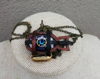 Delicate Steampunk airship zeppelin made of wood, Swarovski Crystal, watch parts and beautiful porcelain bead. DesignBy Alchemy Alice