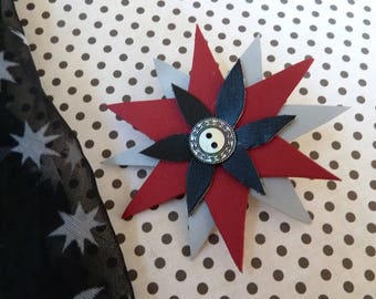 Accessory studs brooch and pin black grey red leather