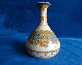 Vintage Portuguese pottery vase with flowers