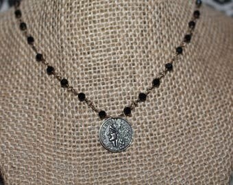 French coin in midnight black