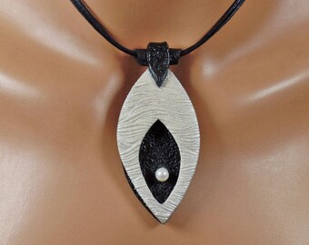 Polymer clay pendant with freshwater pearl