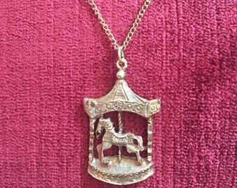 Vintage 1980s goldtone carousel pendant necklace