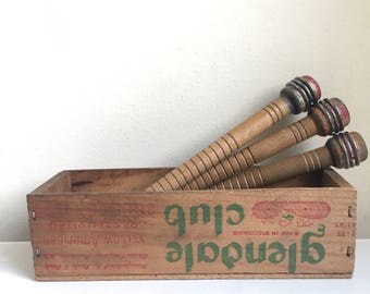 Vintage wooden bobbins in Glendale Club wooden cheese box