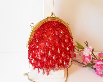 red beaded clutch bag