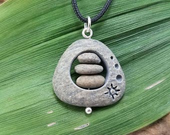 Hand carved rock necklaces by RockYouWear on Etsy