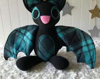 white stuffed bat