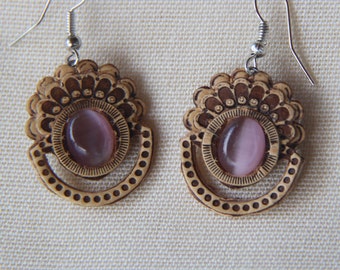 Birch bark earrings .