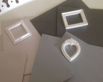 Set of 3 folded cards with envelopes and plastic frames