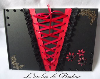 large guestbook Gothic black and red with its laced corset way